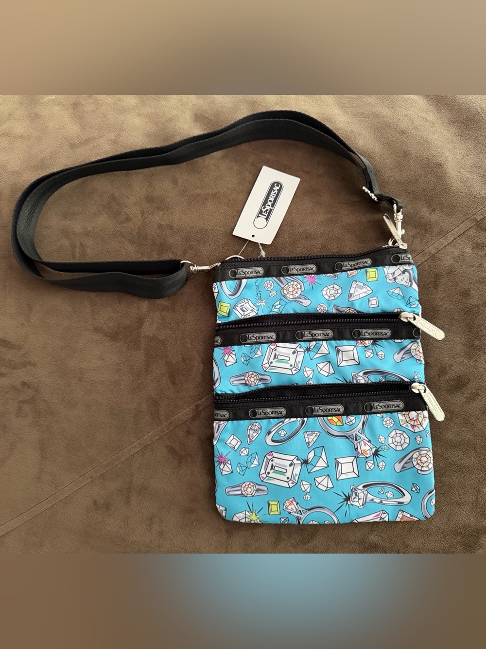 LeSportsac Turquoise Gem Pattern Crossbody Tote with Black Trim